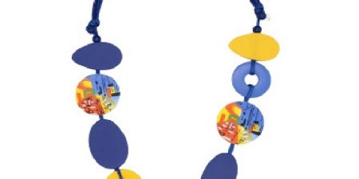 How a Single Piece of Art Jewelry Can Elevate Your Entire Summer Look