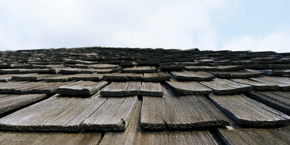 How Roof Coatings Work to Prevent Early Roof Replacement
